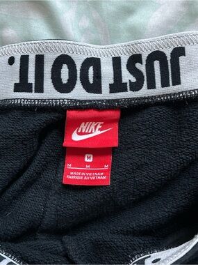 Nike Black Sweatpants with White 'Just Do It' Waistband and Red Tag